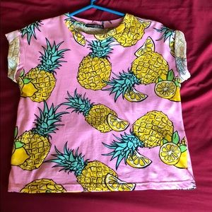 Pineapple printed shirt.